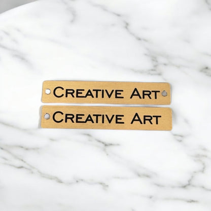 Two toned long rectangle tags with hole/s Gold/Black SET of 20