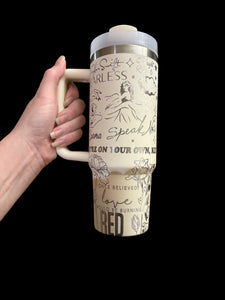 360 Swift cream and silver laser engraved 30 oz tumbler with handle and straw.